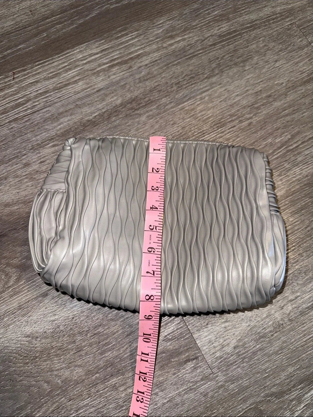Vince Camuto Silver-Gray Quilted Ripple Cosmetic Bag zipper call out